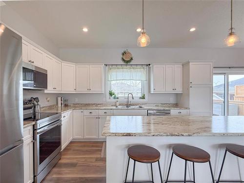 11 Marsh Crescent, Brandon, MB - Indoor Photo Showing Kitchen With Double Sink