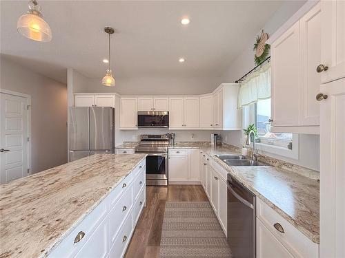 11 Marsh Crescent, Brandon, MB - Indoor Photo Showing Kitchen With Double Sink