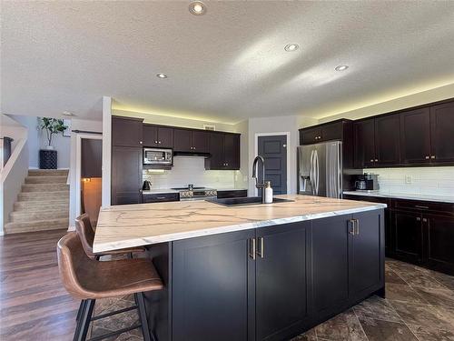 36 Southview Drive, Brandon, MB - Indoor Photo Showing Kitchen With Double Sink