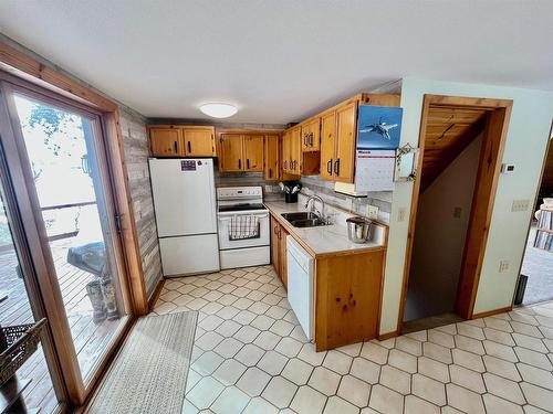 76 Ojibway Drive, Eagle River, ON - Indoor Photo Showing Kitchen With Double Sink