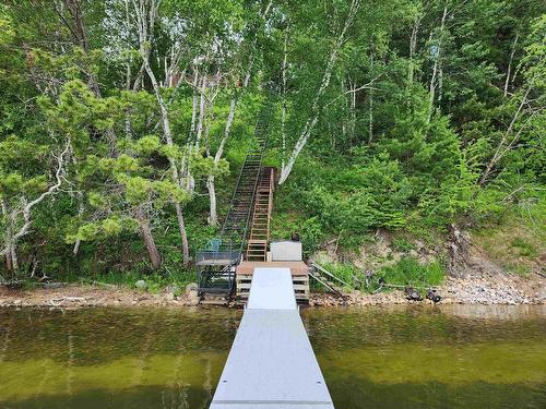 76 Ojibway Drive, Eagle River, ON - Outdoor With Body Of Water