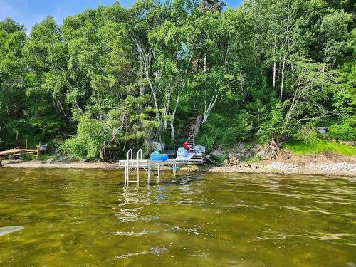 76 Ojibway Drive, Eagle River, ON - Outdoor With Body Of Water