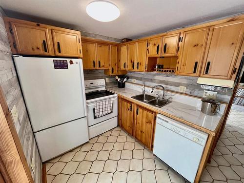 76 Ojibway Drive, Eagle River, ON - Indoor Photo Showing Kitchen With Double Sink