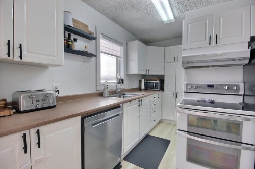Cuisine - 5792 Boul. Témiscamingue, Rouyn-Noranda, QC - Indoor Photo Showing Kitchen With Double Sink