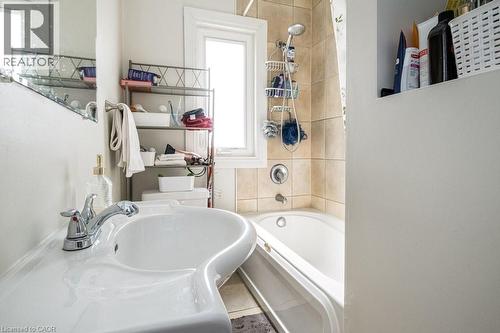 Convenient shelf on the right for added storage. - 500 Ferguson Avenue N, Hamilton, ON - Indoor Photo Showing Bathroom