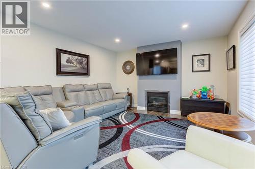 128 Schmidt Drive, Arthur, ON - Indoor Photo Showing Living Room With Fireplace