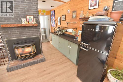 115 4Th Avenue E, Nipawin, SK - Indoor With Fireplace