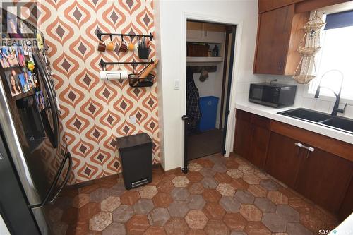 115 4Th Avenue E, Nipawin, SK - Indoor Photo Showing Kitchen With Double Sink
