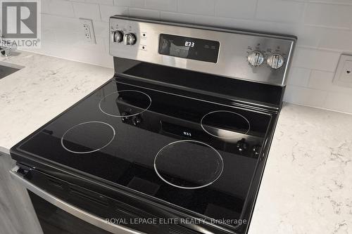 313 - 101 Cathedral High Street, Markham, ON - Indoor Photo Showing Kitchen