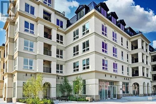 313 - 101 Cathedral High Street, Markham, ON - Outdoor With Facade