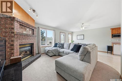 11 Columbia Drive, Saskatoon, SK - Indoor Photo Showing Living Room With Fireplace
