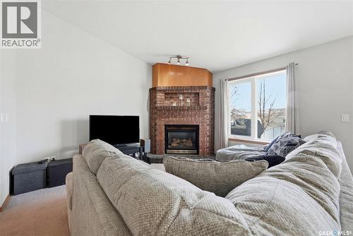 11 Columbia Drive, Saskatoon, SK - Indoor Photo Showing Living Room With Fireplace