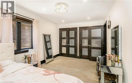 Bedroom featuring light carpet and recessed lighting - 24 Jacob Gingrich Drive, Kitchener, ON - Indoor Photo Showing Bedroom