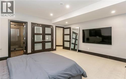 Bedroom featuring carpet, ensuite bath, and recessed lighting - 24 Jacob Gingrich Drive, Kitchener, ON - Indoor Photo Showing Bedroom