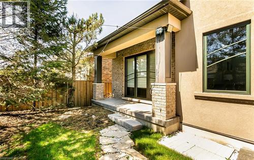 Entrance to property with stucco siding - 24 Jacob Gingrich Drive, Kitchener, ON - Outdoor With Deck Patio Veranda