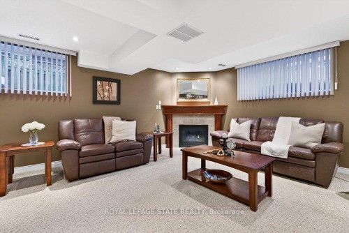 128 Nugent Drive, Hamilton, ON - Indoor Photo Showing Living Room With Fireplace