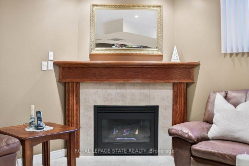 128 Nugent Drive, Hamilton, ON - Indoor Photo Showing Living Room With Fireplace