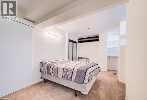 Bedroom with light carpet - 85 Spruce Street Unit# 103, Cambridge, ON - Indoor Photo Showing Bedroom