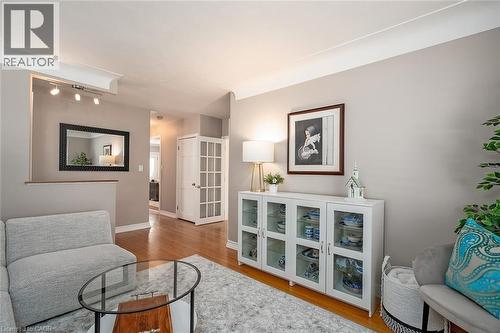 Living area featuring light wood-type flooring and baseboards - 220 Townsend Avenue, Burlington, ON - Indoor Photo Showing Living Room
