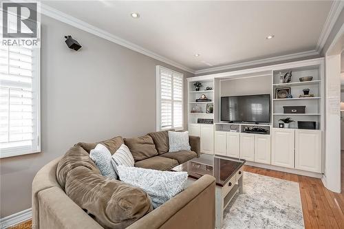 Living area featuring light wood-type flooring, ornamental molding, and recessed lighting - 220 Townsend Avenue, Burlington, ON - Indoor Photo Showing Living Room