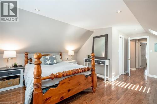 Bedroom featuring vaulted ceiling, hardwood / wood-style flooring, and recessed lighting - 220 Townsend Avenue, Burlington, ON - Indoor Photo Showing Bedroom