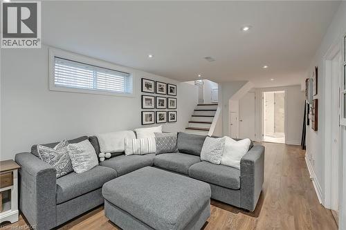 Living area featuring light wood-type flooring and recessed lighting - 220 Townsend Avenue, Burlington, ON - Indoor Photo Showing Living Room