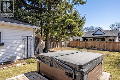 Fenced backyard with a hot tub - 220 Townsend Avenue, Burlington, ON - Outdoor With Deck Patio Veranda