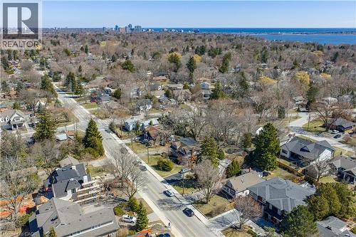Aerial view of property's location with nearby suburban area and a large body of water - 220 Townsend Avenue, Burlington, ON - Outdoor With View