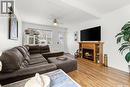 359 4Th Avenue Se, Swift Current, SK  - Indoor Photo Showing Living Room With Fireplace 