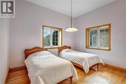 Bedroom with wood-type flooring - 
