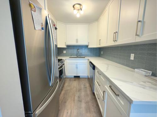 202-3155 Gordon Drive, Kelowna, BC - Indoor Photo Showing Kitchen With Stainless Steel Kitchen With Upgraded Kitchen