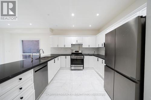Upper - 643 Warhol Way, Mississauga, ON - Indoor Photo Showing Kitchen With Double Sink With Upgraded Kitchen