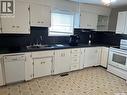 101 2Nd Avenue E, Lafleche, SK  - Indoor Photo Showing Kitchen With Double Sink 