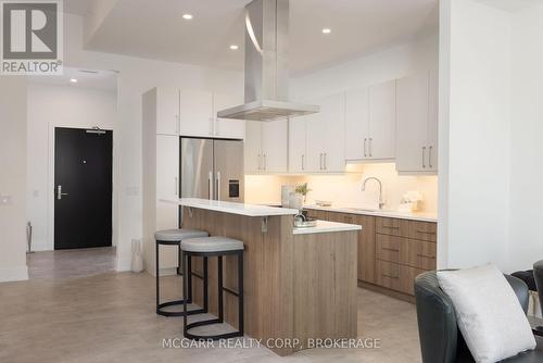 Fisher & Paykel appliances - 403 - 77 Yates Street, St. Catharines (Downtown), ON - Indoor Photo Showing Kitchen With Upgraded Kitchen