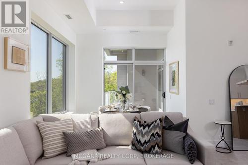 Access to balcony - 403 - 77 Yates Street, St. Catharines (Downtown), ON - Indoor Photo Showing Living Room