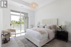 Primary suite with balcony access - 