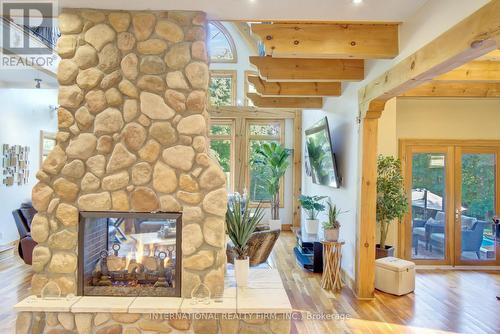 6 Pinehurst Lane, Springwater, ON - Indoor Photo Showing Other Room With Fireplace