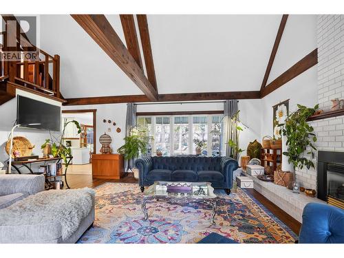 6119 Pippers Lane, Nelson, BC - Indoor Photo Showing Living Room With Fireplace