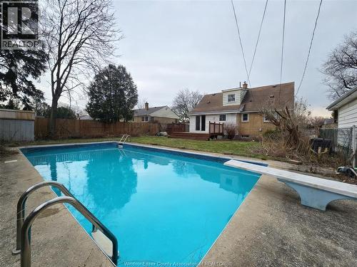 3672 Morris Drive, Windsor, ON - Outdoor With In Ground Pool With Backyard