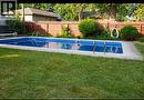 3672 Morris Drive, Windsor, ON  - Outdoor With In Ground Pool With Backyard 
