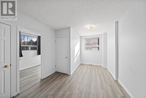 Living room w bright window & vinyl flooring. - 234 Rochester Street, Ottawa, ON - Indoor Photo Showing Other Room