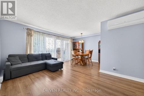 Floor-to-Ceiling Window Appeal - 404 - 158 A Mcarthur Avenue, Ottawa, ON - Indoor Photo Showing Living Room