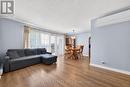 Floor-to-Ceiling Window Appeal - 404 - 158 A Mcarthur Avenue, Ottawa, ON  - Indoor Photo Showing Living Room 