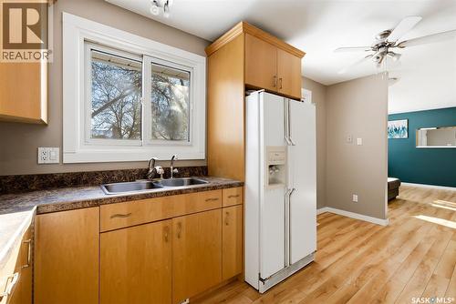 22 Sibbald Crescent, Regina, SK - Indoor Photo Showing Kitchen With Double Sink