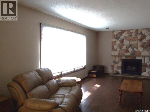 301 5Th Street W, Leader, SK - Indoor Photo Showing Living Room With Fireplace