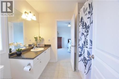 Full bath featuring vanity, curtained shower, and ensuite bath - 512 Terrington Crescent, Kitchener, ON - Indoor Photo Showing Bathroom