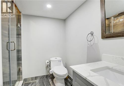 Bathroom with vanity, a shower stall, and recessed lighting - 7 Cardill Crescent, Waterloo, ON - Indoor Photo Showing Bathroom