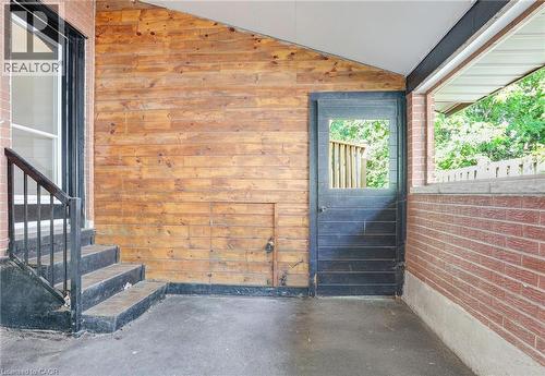 View of exterior entry featuring a patio area - 7 Cardill Crescent, Waterloo, ON - Outdoor With Exterior