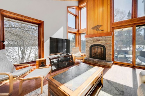 Salon - 20 Ch. Ovila, Mont-Tremblant, QC - Indoor Photo Showing Living Room With Fireplace