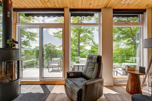 Salon - 321 Ch. Du Versant, Saint-Donat, QC - Indoor With Fireplace